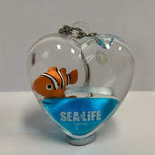 Load image into Gallery viewer, SEA LIFE Sydney Heart Shaped Keyring with Clownfish in Blue Liquid

